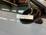 a sticker on the side mirror of a car