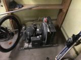 a bike that is parked next to a bike in a garage