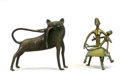 Deux sujets en alliage de cuivre patiné : un lion stylisé fi…