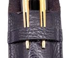 a black leather case with two brass cups in it