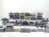 a lot of toy cars that are sitting in a box