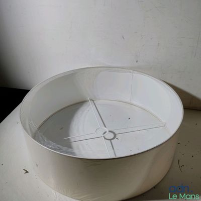 a white bowl sitting on top of a counter