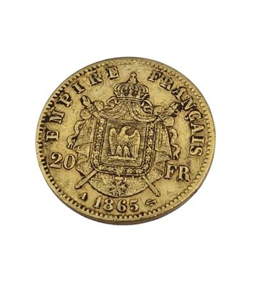 l'image d'une pièce d'or sur laquelle figurent des armoiries