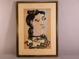 une image représentant un tableau représentant le visage d'une femme, dans un cadre doré
