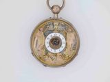 a gold pocket watch with a clock on it