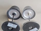three different types of lamps on a white surface