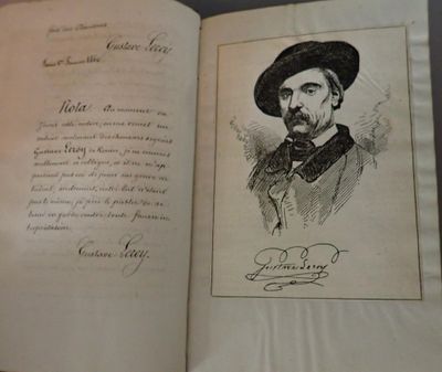 an old book with a drawing of a man in a hat