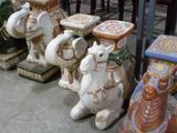 many vases that are sitting on the floor