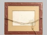 an old picture frame with a picture hanging on a wall