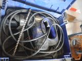 a blue box with a bunch of tools inside of it