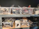 a shelf with many different types of electronics on it