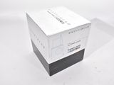a box that is sitting on a table with a knife in it