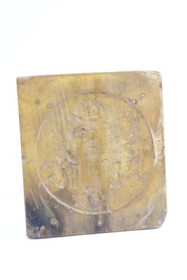 a picture of a gold coin on a white surface