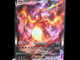 a close up of a pokemon card with a black background