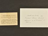 a piece of paper and a piece of paper with writing on it