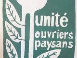a green sign with a wren on it that says unite guylier ' s payans