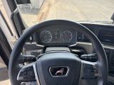 a steering wheel and dashboard of a vehicle