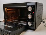 an image of a toaster oven sitting on a counter