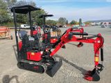 an image of a small excavator parked in a parking lot