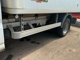 a truck that is parked on the side of the road