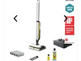 a close up of a vacuum cleaner and cleaning supplies on a white background