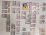 a picture of a fridge with a bunch of stamps on it
