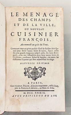 an old book with a title on it sitting on a table