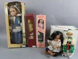 two dolls are sitting next to each other on a table