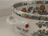 a white bowl with a floral design on it