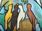 three birds that are sitting on top of a vase