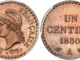 an old coin with a woman ' s head on it
