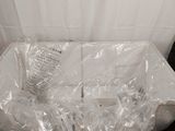 a box that is wrapped in plastic and sitting on the floor