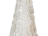 a white vase with a design on it on a white surface