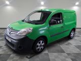 a picture of a green van parked in a garage