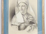 an old picture of a woman holding a baby in her arms