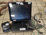 a laptop computer sitting on top of a table