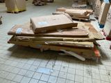 a pile of boxes on the floor in a warehouse