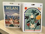 two boxes with a picture of a city on them