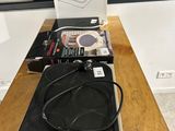 a box with a pair of headphones sitting on top of it