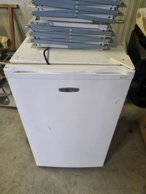 a stack of white appliances sitting on top of each other
