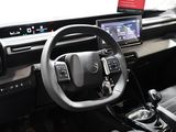 a car dashboard with a steering wheel and a dash board