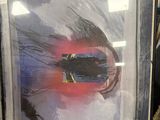 framed painting of a red and blue abstract painting in a black frame