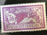 a close up of a stamp with a picture of a woman on it