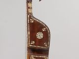 a musical instrument that is hanging from a string
