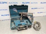 a tool in the case that is sitting on the floor