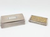paire d'étuis à cigarettes en argent et en or, ornés de motifs gravés