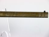 a wooden beam that is attached to a white wall