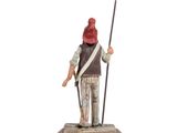figurine of a man with a red hat holding a spear on a wooden base