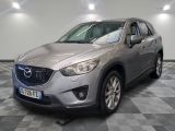 the mazda cx - 5 is parked on a checkered floor