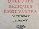 an old book with french writing on it sitting on a table